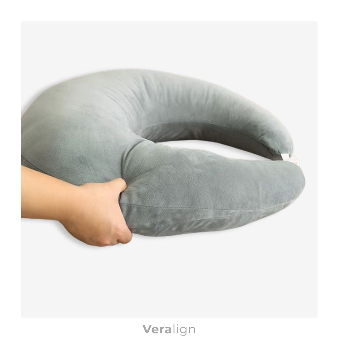 Vue latérale du coussin ergonomique de lecture rond Veralign conçu pour soulager les épaules et les poignets pendant la lecture.
