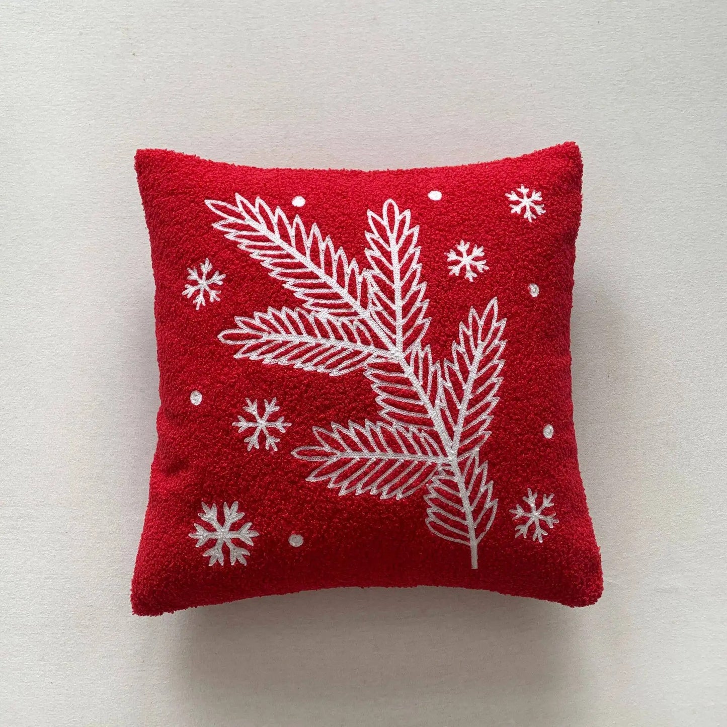 Housse de coussin de Noël branchages et flocons Rouge